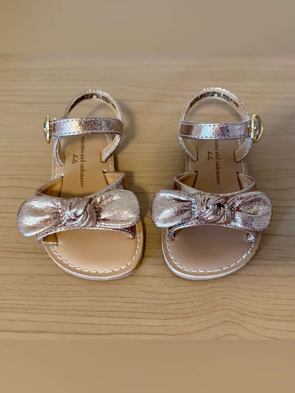 Cupcakes & cashmere Metallic Gold Bow Toddler Sandals